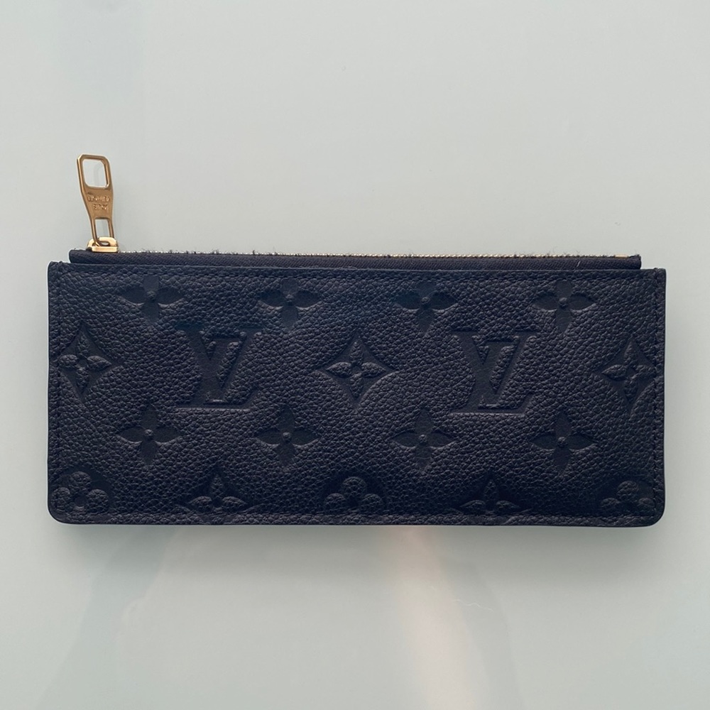 Louis Vuitton Coin Pouch
Monogram Empreinte Leather